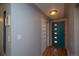 Entryway featuring a modern front door with unique detailing and hardwood floors at 2605 Crabapple Ct, Golden, CO 80401