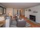 Cozy living room with modern fireplace, comfortable seating, and stylish décor at 2605 Crabapple Ct, Golden, CO 80401