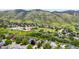 Aerial view of neighborhood nestled at the base of the foothills, offering scenic mountain views at 473 Somerset Dr, Golden, CO 80401