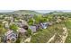 Stunning aerial view of a hillside neighborhood with houses near lush greenery at 473 Somerset Dr, Golden, CO 80401