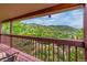 Relax on the outdoor balcony and take in the beauty of the mountain landscape at 473 Somerset Dr, Golden, CO 80401