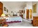 Bright main bedroom with a view of a private bathroom and three closets at 473 Somerset Dr, Golden, CO 80401