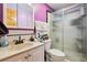 Bathroom featuring a vanity with sink and a glass-enclosed shower at 6314 W 92Nd Pl, Westminster, CO 80031