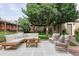 Serene backyard patio featuring modern outdoor furniture, perfect for relaxing or entertaining at 1272 S Milwaukee St, Denver, CO 80210