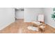Spacious basement area featuring cork floors, a table, and an art easel at 1272 S Milwaukee St, Denver, CO 80210