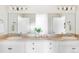 Spacious bathroom with double sinks, a large mirror, and ample counter space at 1272 S Milwaukee St, Denver, CO 80210