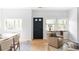 Welcoming entryway featuring hardwood floors, natural light, and neutral decor at 1272 S Milwaukee St, Denver, CO 80210