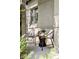 Relaxing front porch area with patio furniture, perfect for enjoying the outdoors at 1272 S Milwaukee St, Denver, CO 80210