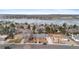 Captivating aerial view of a lakeside neighborhood offering serene surroundings and stunning scenery at 4731 W 66Th Ave, Arvada, CO 80003