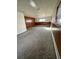 Carpeted basement room with wood paneled walls at 4731 W 66Th Ave, Arvada, CO 80003