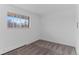 Bedroom features neutral carpeting and large window bringing in natural light at 4731 W 66Th Ave, Arvada, CO 80003