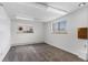 Finished basement bonus room with carpet and natural light from two windows at 4731 W 66Th Ave, Arvada, CO 80003
