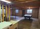 Partially finished basement featuring an unfinished ceiling, concrete floor, and lots of potential at 20596 E Shefield Ct, Parker, CO 80138