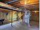 Partially finished basement featuring an unfinished ceiling, concrete floor, and lots of potential at 20596 E Shefield Ct, Parker, CO 80138