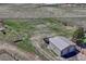 Aerial view of the metal outbuilding and property at 7605 Shenandoah Dr, Elizabeth, CO 80107