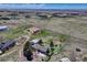 Aerial view of the property and home with expansive views at 7605 Shenandoah Dr, Elizabeth, CO 80107