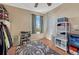 Well-organized bedroom with natural light, closet, and storage solutions to maximize space and functionality at 7605 Shenandoah Dr, Elizabeth, CO 80107