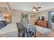 Relaxing main bedroom featuring a comfortable bed, natural light, and ample space for restful nights at 7605 Shenandoah Dr, Elizabeth, CO 80107