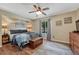 Inviting main bedroom with a comfortable bed, soft lighting, and a serene atmosphere for relaxation at 7605 Shenandoah Dr, Elizabeth, CO 80107