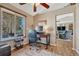 Cozy office space with a comfortable chair, desk, and window offering natural light, perfect for working from home at 7605 Shenandoah Dr, Elizabeth, CO 80107