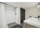 Updated bathroom with a tiled shower, black fixtures, and modern vanity for a spa-like feel at 142 N Logan St, Denver, CO 80203