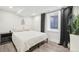 A serene bedroom with a large window, a comfortable bed, and ample natural light at 142 N Logan St, Denver, CO 80203