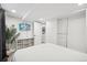 Relaxing bedroom with a tv, neutral colors, and an closet, creating a peaceful retreat at 142 N Logan St, Denver, CO 80203