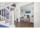 Beautifully appointed living room showing the hardwood floors and updated fireplace at 142 N Logan St, Denver, CO 80203