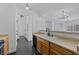 Functional kitchen featuring wood cabinets, modern appliances, and a double sink at 5255 Memphis St # 1112, Denver, CO 80239