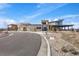 Modern clubhouse exterior with stone accents, expansive windows, and well-maintained landscaping at 455 Rogers Way, Castle Rock, CO 80104