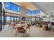 Bright common area featuring vaulted ceilings, large windows, a fireplace, and stylish seating at 455 Rogers Way, Castle Rock, CO 80104