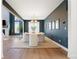 Stylish dining room with modern chandelier and seating for six at 455 Rogers Way, Castle Rock, CO 80104