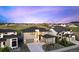 Stunning two-story home showcasing manicured landscaping, a spacious driveway, and an attached two-car garage at 455 Rogers Way, Castle Rock, CO 80104