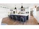 Spacious kitchen with oversized island, stainless appliances, and ample cabinet space at 455 Rogers Way, Castle Rock, CO 80104