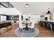 Spacious open-concept layout, connecting living, dining, and kitchen areas at 455 Rogers Way, Castle Rock, CO 80104