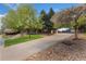 Lovely single-Gathering home with mature trees and landscaped yard with long driveway at 7220 Spring Creek Cir, Niwot, CO 80503