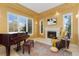 Inviting living room featuring a fireplace, large windows, and comfortable seating perfect for relaxation at 7220 Spring Creek Cir, Niwot, CO 80503