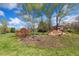 Scenic neighborhood featuring mature trees, green lawns, and a charming welcome sign for Westerly Park at 7220 Spring Creek Cir, Niwot, CO 80503