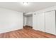 Bedroom with laminate floors and a closet at 2297 S Oswego Way, Aurora, CO 80014