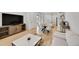 Stylish living room with contemporary furnishings and an open layout to the kitchen at 4612 S Wenatchee St # A, Aurora, CO 80015