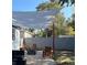 Relaxing backyard patio with shade cover, stylish outdoor seating, and a fire pit for entertaining at 4463 Steele St, Denver, CO 80216