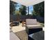Outdoor patio area featuring comfortable seating, stylish accents, and a cozy fire pit for entertaining at 4463 Steele St, Denver, CO 80216