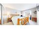 This charming bedroom features a unique wood frame bed, creating a cozy retreat at 8300 W 87Th Dr # B, Arvada, CO 80005