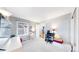 Bright, carpeted bedroom offers a comfortable and quiet retreat with ample natural light from a large window at 8300 W 87Th Dr # B, Arvada, CO 80005