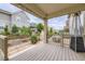 Outdoor back porch with a patio heater and outdoor furniture at 1063 Sandstone Cir, Erie, CO 80516
