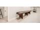Finished basement features a shuffleboard table and workout space at 1063 Sandstone Cir, Erie, CO 80516