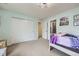 Bright bedroom with neutral paint and large closets at 1063 Sandstone Cir, Erie, CO 80516