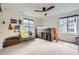 Cozy bedroom featuring a rustic-style loft bed and bright windows at 1063 Sandstone Cir, Erie, CO 80516