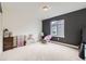 Bright and airy bedroom with ample natural light and neutral color scheme at 1063 Sandstone Cir, Erie, CO 80516