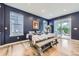 Stylish dining room with a large table, modern decor, and plenty of natural light at 1063 Sandstone Cir, Erie, CO 80516
